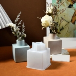 flower vase silicone mold and gypsum created vases holding fowers