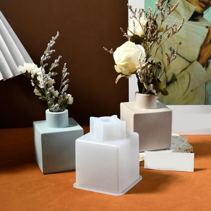 flower vase silicone mold and gypsum created vases holding fowers